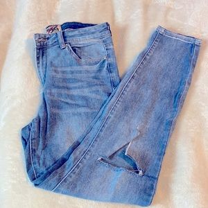 Blue knee ripped jeans